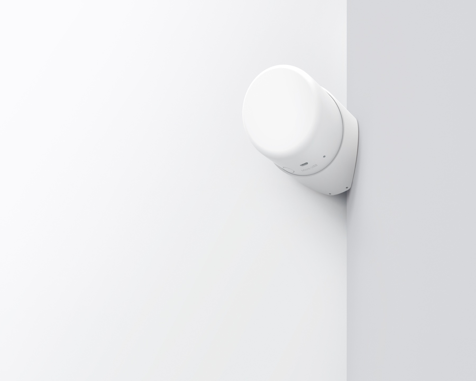 The Silvie contactless room sensor mounted on a wall