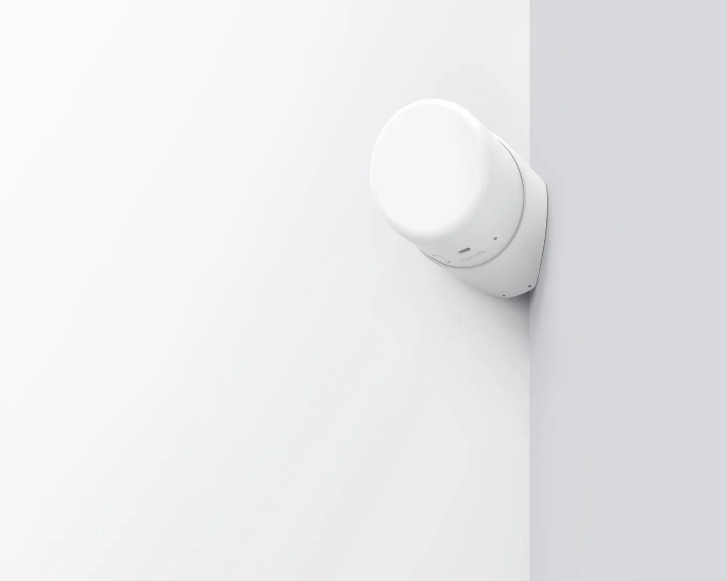 The Silvie contactless room sensor mounted on a wall
