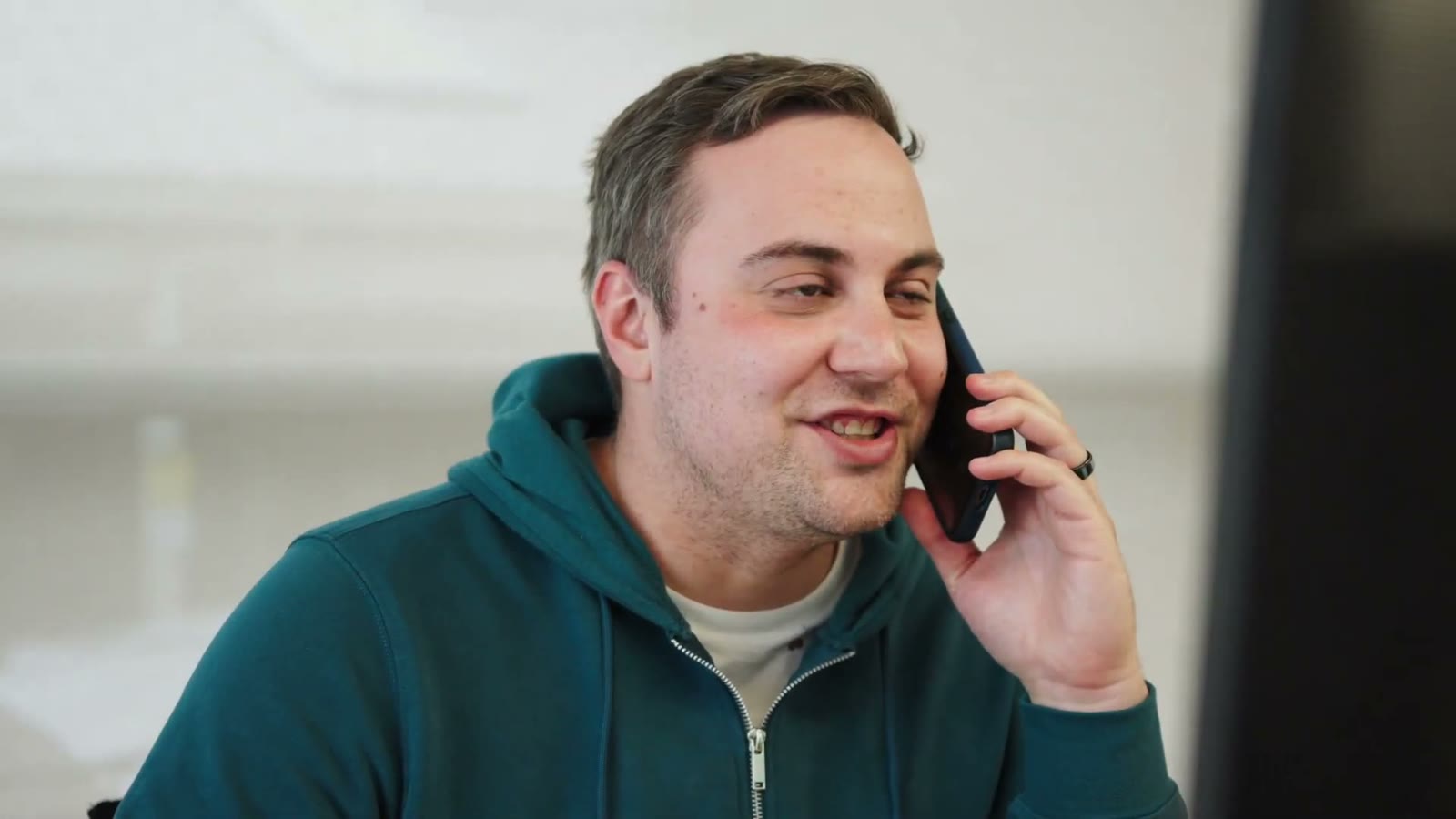Adam on the phone, checking in